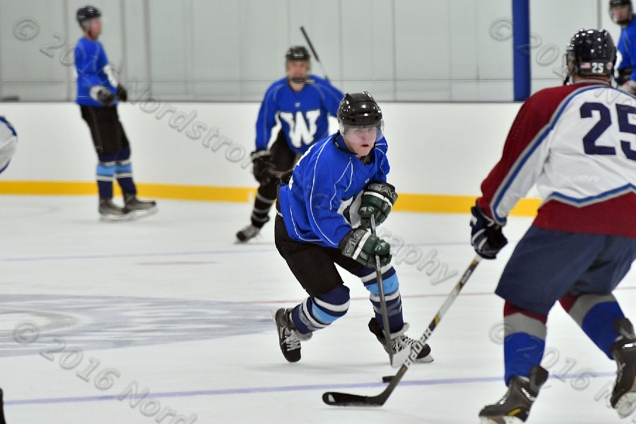 Wheaton College Men\'s Ice Hockey vs Middlesex Community College. - Photo By: KEITH NORDSTROM